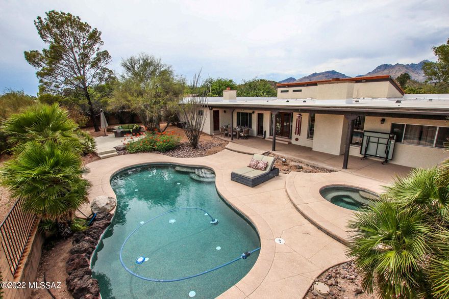 Located in the wonderful Sabino Vista Hills and resting on a high corner lot, is this Gorgeous & Updated 4 bedroom 4 bath home. Features a split floor plan, vaulted ceilings, exposed beams and 3 Fireplaces! The gourmet kitchen boasts an oversized center island, (granite top) SS appliances, gas range, vent hood, custom subway backsplash and quartz tile counter tops. Spacious Primary suite with cozy fireplace, double vanity, quartz counter tops, and HUGE '' view'' shower. The backyard oasis is perfect for entertaining with its sparking pool, relaxing spa, covered patio and sitting area with firepit. Don't forget those Amazing Mountains! Come take a view!