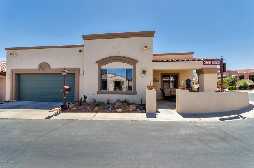 One look at this desert gem & you'll be captivated by the upgraded high end finishes! This former model home is positioned perfectly on an oversized corner lot. Be delighted to see 18x18 ceramic tile in all areas excluding the bedrooms. The kitchen is adorned by beautiful 42'' cherry cabinets.  Delight in the peaceful AZ evenings while out on the front courtyard patio. It has been recently walled in with a lovely entry gate, so its safe for your little furry family members. The energy efficient 2x6 construction lets you have low utility costs, plus it has a long lasting membrane roof. C-fans in every room for added comfort. The 2 car garage is larger than most in the area. Exterior was painted in 2017. You can be as active as you wish with a wide range of social events & a fitness center.