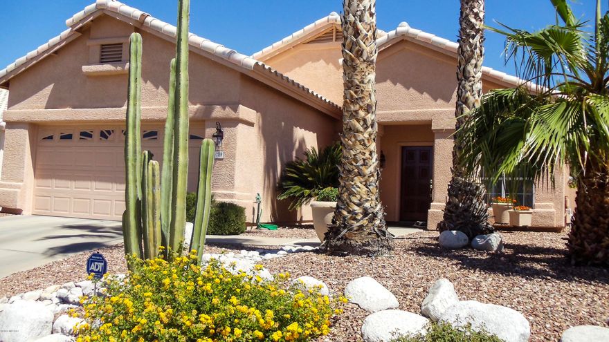 Gorgeous 4BR / 2Bath.  Home is located in district 16 school system in the foothills area.  Within walking distance to Sabino Canyon and near Mt. Lemon.  Also near shopping and dining.  This home is very well taken care of.  Recently remodeled with new Italian ceramic tile and upgraded carpet in the bedrooms.  Custom semigloss paint throughout home. Installed granite and remodeled kitchen with stainless steel appliances.  Bathrooms were also remodeled with tile throughout and new cabinets.  New ceiling fans and lighting.  Home was former model with upgraded steel framing.  Garage has extra built in storage cabinets and enclosed hot water tank and furnace.  Garage floor has epoxy paint for a clean look.  Front and rear enclosed yard are low maintenance with irrigation system and tiled porch
