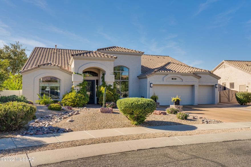 Beautiful Oro Valley 4bd 3 ba on a private cul de sac lot. This home has been completely updated inside and out and features soaring ceilings, large windows that frame our amazing desert landscape, designer details throughout.  Extended back patio makes a great space for entertaining. Jump into your heated sparkling pool or spa. Enjoy your outdoor fireplace on  those cool AZ nights while listening to the sound of water trickle in the fountain.  Beautiful roses and citrus trees are part of this amazing backyard space.  This lot backs to open desert space and captures views of the Tortolitas.