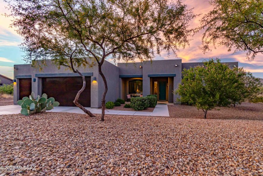 As you step into this masterpiece, you will be taken aback by the quality and spaciousness of this beautiful, better than new, semi custom home. Interior  Designer touches throughout. 8' Knotty Alder entry door opens into the Foyer, this impeccable home offers a panoramic view of Saguaro National Park E. Expansive Great Room flows into the Gourmet Kitchen that boasts a massive island, Alder upgraded cabinets w/crown moldings, Recycle drawer, under counter lighting, drawers w/full extension & a soft close feature, 3 cm Natural Stone Granite countertops, 5 burner 36'' Thermador gas cooktop, 30'' Convection oven & Bosch 800 Series Dishwasher. Mountain views surround you from all sides. Luxury Owners Suite has motorized Hunter Douglas blinds showcasing Rincon Mountains. 4' Extension in garage.