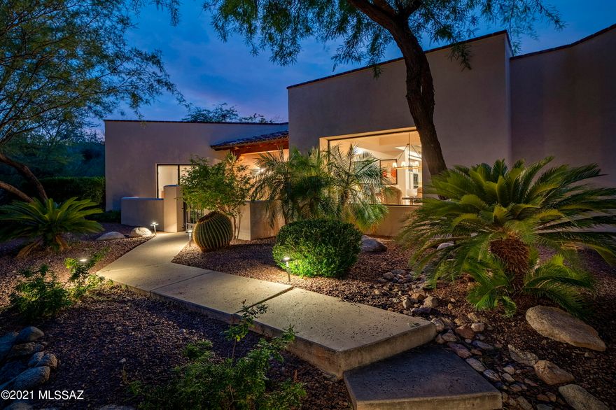 This perfectly executed Ron Robinette designed and Mark Alan built home incorporates a masterful blend of textures, elegant finishes and stylish details. Located in the highly sought after gated community of Ventana Ridge and situated on an elevated private homesite, with walls of glass stretching out into the natural view corridors. The open floor plan offers effortless flow from room to room, with a dedicated owner's-wing and 3 additional suites, creating the perfect balance for both winter visitors, or full time residents alike. The interior features an open concept plan, with a top-end gourmet kitchen, complete with Decor stainless steel appliances, Sub Zero refrigerator and Bosch dishwasher, modish colored cabinetry, with stainless pulls, contrasting against soft granite countertops. Comprised of four bedrooms and three baths, which includes the owner's suite, featuring a large walk-in closet, luxurious master bathroom, with modern designer fit and finish. Enveloping the residence are a number of outdoor living spaces, each of which has been thoughtfully positioned to procure the utmost enjoyment looking out over view corridors and tranquil surroundings. Fostering an indoor-outdoor lifestyle, takes full advantage of proximity to Sabino Canyon, Canyon Ranch, essential goods and services, as well as fine and casual dining.