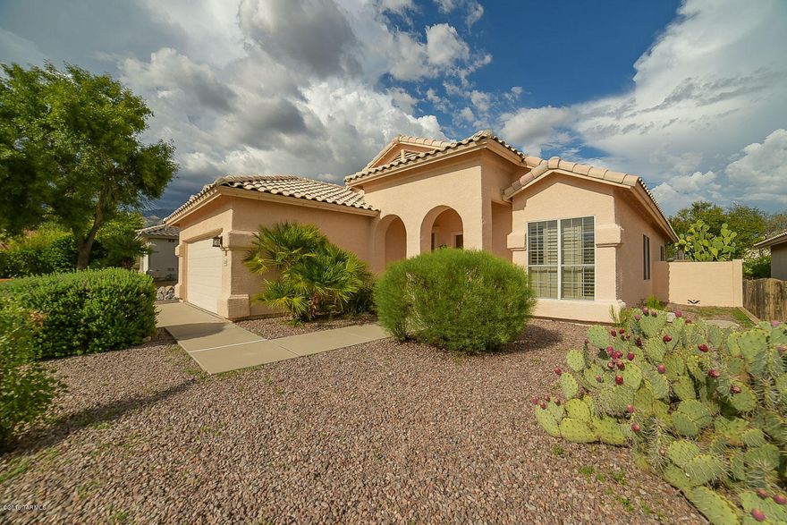Location, Location, Location!! Be in the center of the Best Of Tucson. Very close to the hiking & waterfalls of Sabino Canyon Rec Area, the World-Class golfing of Ventana Canyon Resort/Spa, popular restaurants and boutique shopping. One of the best school District in Tucson-District 16! This is a great House in a highly desired Neighborhood! Crisp, fresh colors with an open, inviting floor plan that pours into the living space. Spacious living room with Corner Fireplace & built-in bookshelves; bright open kitchen/dinette with new window coverings. Split floor plan, large Master boasts a new Master Bath Shower and a His/Hers Vanity. Ceiling fans in all bdrms and family rm. Prolific citrus tree, enjoy fresh OJ on the sizable covered patio. All new screens. Great Price for a Great Home!!