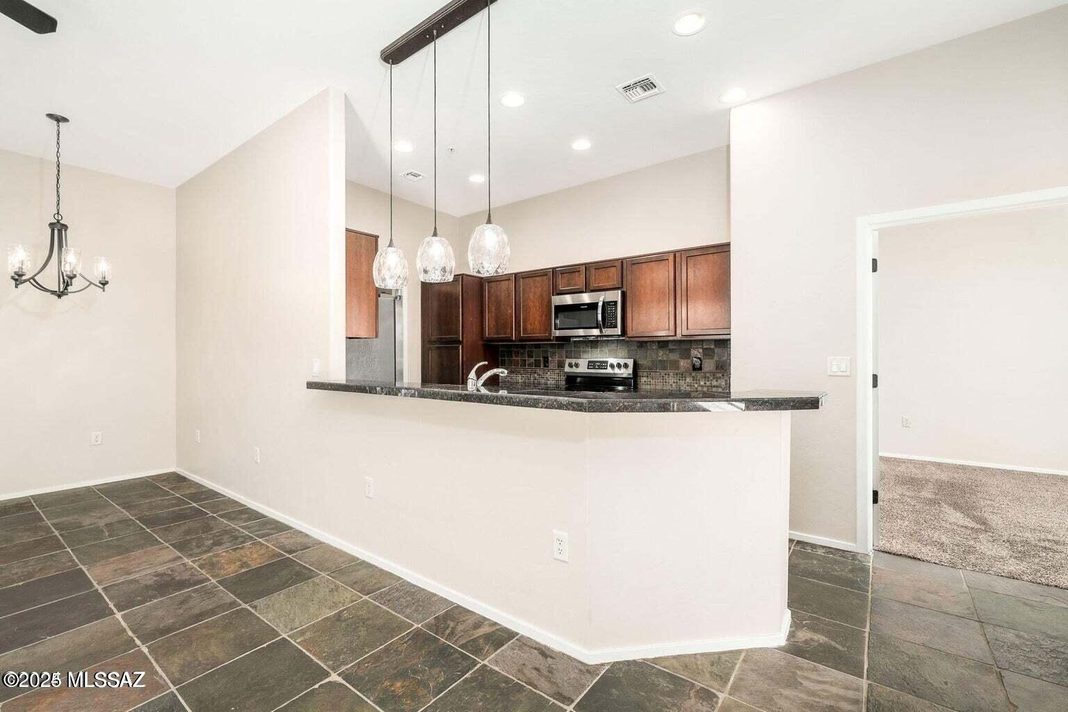 2010 E River Road 202