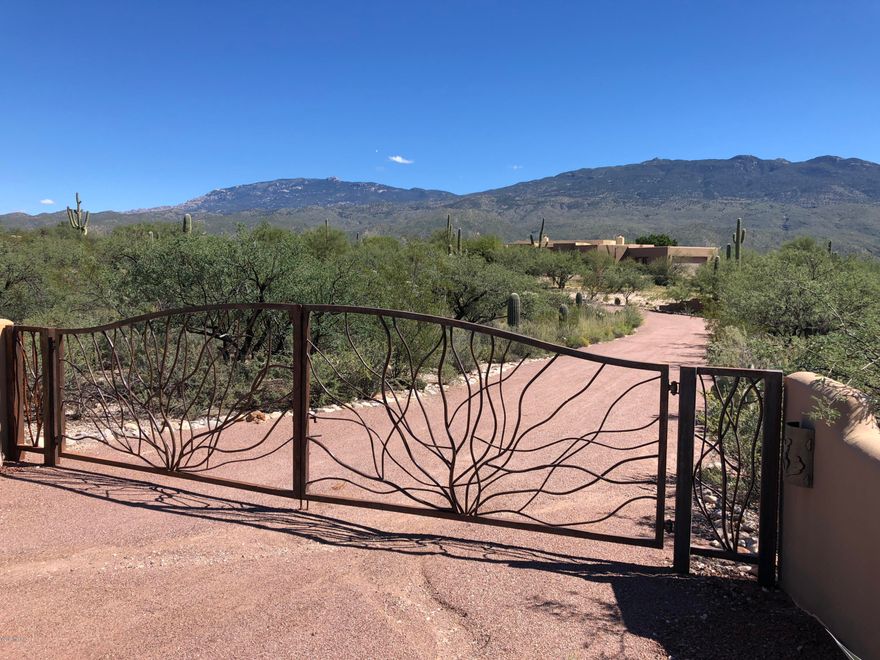 Fabulous SOUTHWEST COMPOUND ideally located in Highly Sought out LA CEBADILLA ESTATES. 5.15 Acres with a Wonderfully Upgraded Home - 3815 Sq Ft; 4BR/3.5BA & Extended 2 Car Garage. Includes Horse Facilities (2 horses allowed) and Amazing Panoramic VIEWS. Private Gated Entry, Beautiful Courtyard w/Entry Gate. Home includes Saltillo Tile Throughout, High Plank Beamed Ceilings, Decorative Tile and Saguaro Rib Accents, Spacious Family Room w/Fireplace. Incredible Entertainer's Kitchen w/Slab Granite Counter Tops, Hand Crafted Cherry Cabinets, Built-In Refridgerator, Stainless Steel Appliances & Breakfast Nook w/Bay Window Overlooking Covered Patio. Lushly Landscaped and Gated Backyard includes: Pool & Spa, Built-In BBQ, Cozy Fireplace w/Seating and VIEWS. This is one of the finest communities in the entire East Side. Call today for a personal showing.