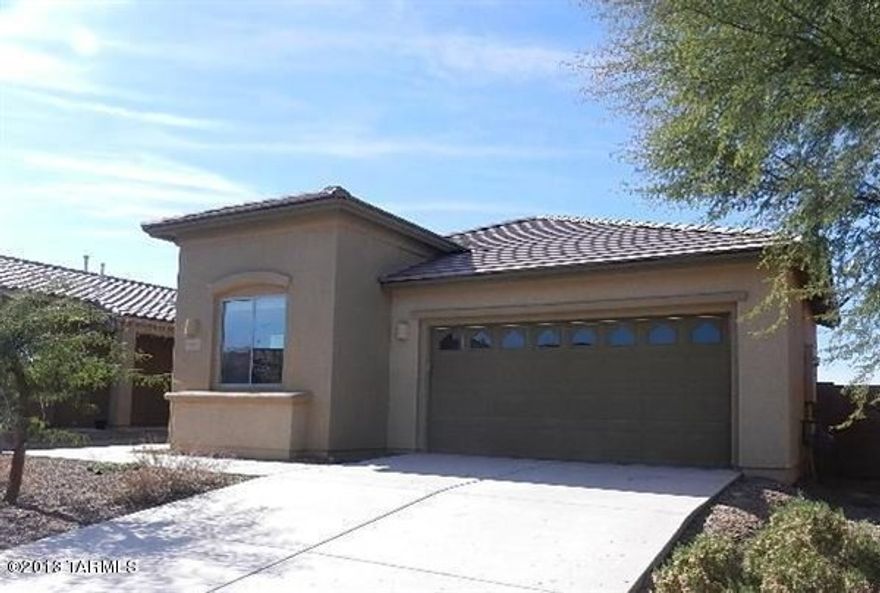 This is a beautiful home with lots of upgrades throughout.  Tile in all main living areas, carpet in bedrooms, upgraded kitchen, master bathroom with dual sinks and separate shower and tub, covered back patio and large backyard.  No neighbors behind the property.
