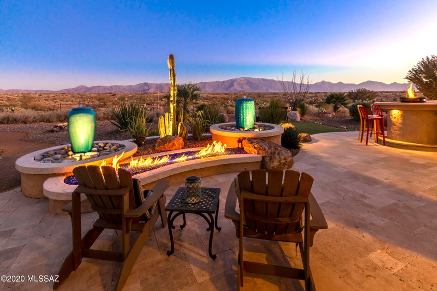 You will be delighted with this BRISA model w/full panoramic mountain view. Too many top-of-the-line features to list. Some of the attention to detail upgrades include *Elegant Kitchen w/high end Miele appliances, granite countertops, full backsplash, island and breakfast bar, upgraded pendant lights, a cabinet pantry, walk-in pantry & valet *Large built-in wine cooler & feature wall w/stone accents in Great Rm *Built in bar/buffet in Dining *Morning Rm w/fireplace, stylish stone decor, and built-in cabinetry *Large Owner's Suite w/En-suite Bath featuring curbless shower & generous walk in closet w/ organizers *A/C cooled insulated extended 2 car garage and golf cart storage, over height doors *Generous travertine patio w/ two firepits, hot tub, rolling shutters. So much more!