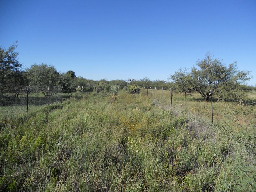 This is a nice flat piece of land at the end of the road.  Owner had a well drilled that is capped and ready to be put into use. Utilities are at the property line which makes it ready for your site built or manufactured home. there is plenty of space for horses, workshop and garden and you will still room to roam. Gorgeous views of the mountains.