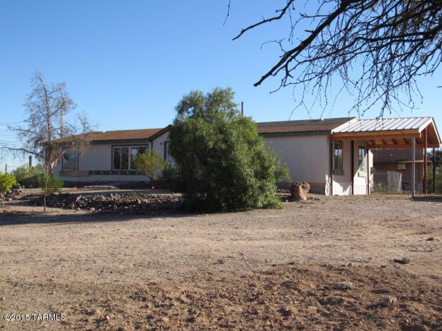 Save thousands on this HUD home is a great value for the modest price. 4 bedrooms 2 bath home.  On 1.13 acre of lush desert. Room to store the toys, 2 car carport.  This is perfect affordable living. Great potential with minor work required.  Opportunity for the budget minded. A rare find at a low price.  Mountain views.  Be ready for the peace and quiet only country living can offer. Yet so close to downtown. Rare acre lot in city limits, located at Starr Pass and La Cholla. This is a must see.  


Note buyers will be responsible for utility turn-on and any required permits for utility connect and re-winterization fee. Buyer to verify all info.