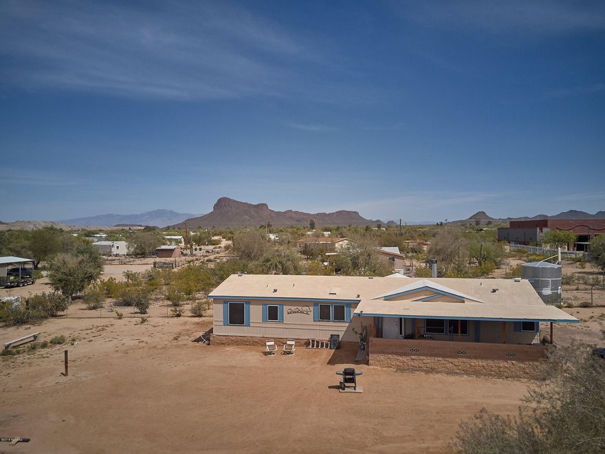 Great property on West-Side of Tucson.
Lots of room for toys, gardens or extra buildings or even a Pool.  Just off of Sandario Road with over an acre of views ad space.  Great updated Home that will not last.  Split bedroom plan and lots of room for storage.  This is a well maintained property that has peace and quiet and within just a few minutes of shopping and needed services.  The pride of ownership shows throughout this place.  Seller is sad to go but is motivated to sell.  Come see it today as it will not last long...Call for your private showing today...