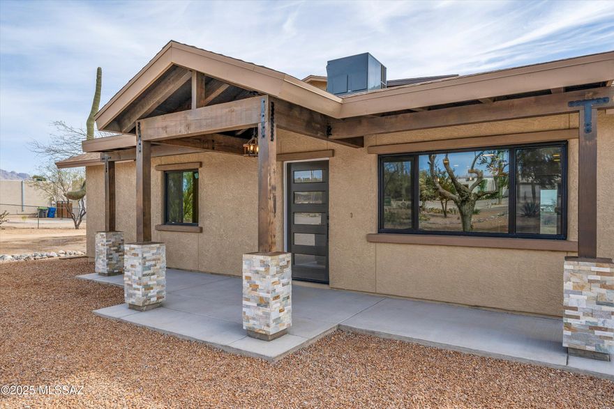 Motivated Seller! Views, Views! Welcome to this beautifully renovated home in the heart of equestrian properties! 3681 W. Potvin Ln, located on a peaceful dirt road, offers modern luxury and a Tucson ranch vibe with stylish updates throughout.
Discover an open-concept floor plan with sleek new plank flooring, fresh paint, and abundant natural light. The chef-inspired kitchen is a true highlight, featuring new cabinetry, Quartz countertops,  stainless steel appliances, and a breakfast bar perfect for casual gourmet meals. The two primaries (one upstairs, one downstairs) are retreats with private en-suite bathrooms offering modern fixtures, Quartz countertop vanities, and large walk-in showers. Two other nicely sized bedrooms offer space for an office or guests. Outside, the spacious backyard provides a customizable space with ample room for outdoor entertaining, gardening, or simply relaxing under the Arizona stars. The covered patio and balcony make it an ideal spot to enjoy Tucson's beautiful year-round weather. Bring your horses to the newly built covered space and outdoor shed for a possible tack room. 

This home has not just been renovatedit's been meticulously upgraded with almost everything new, ensuring you experience both comfort and convenience. Don't miss the opportunity to make this stunning, turnkey home yours!