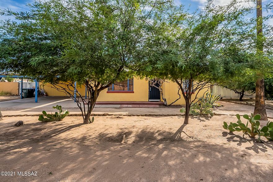 Very cute 2 bed, 1 bath home just east of Reid Park. All the cool stuff from the 1940's including stained concrete floors, crank wndows, huge yards, front & back porch, yellow and black ceramic tile in the kitchen & bath...and the updates you want; updated electric panel and HVAC. County records from 1998 shows permit for carport, storage and laundry rooms. Double gate access to backyard for RV, trucks and toys. Call today for your personal tour!