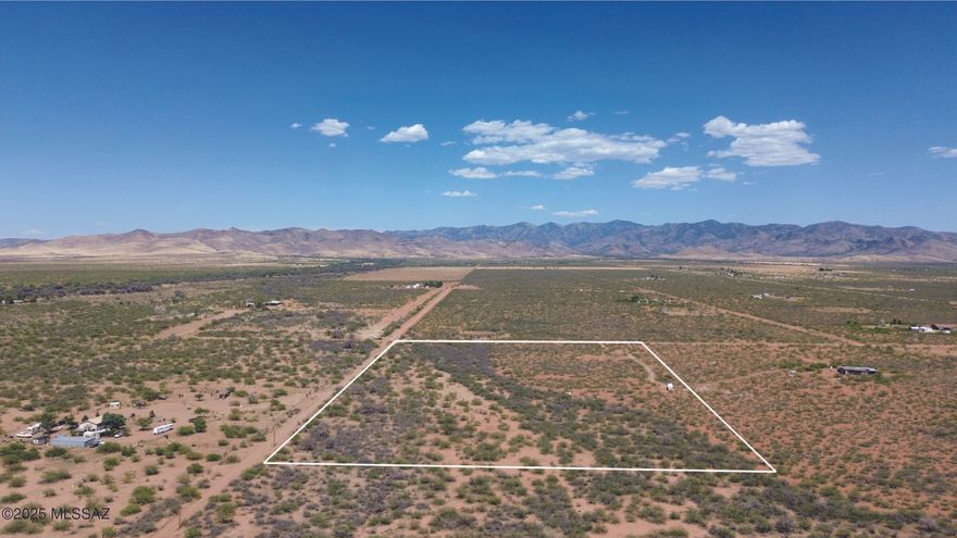 Discover peace and wide-open space on this stunning 20-acre RU-4 zoned parcel. Located on a corner lot with power and fiber optic internet available at the lot line, this property offers both convenience and seclusion. Enjoy panoramic mountain views right from your doorstep, with the majestic Chiricahua Mountains just a short drive away—perfect for hiking, hunting, exploring, or simply unwinding in nature. Less than 1/2 mile from pavement.