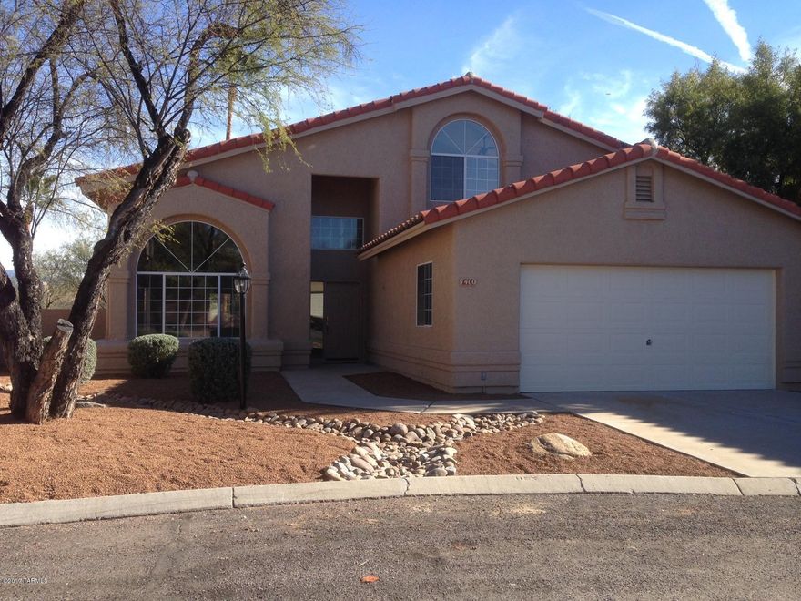 Completely remodeled contemporary home on quiet cul de sac. Polished porcelain tile accentuates the large, open living space. Gorgeous custom kitchen & bath cabinets w/ quartz countertops and waterfall peninsula. New HVAC w/ 5 year warranty. Replastered pool. New interior/exterior paint & light fixtures. New landscaping. Lovely and stunning.