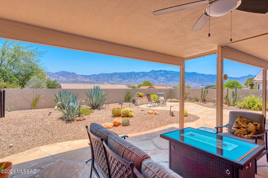 Updated & renovated double master Topaz with open desert in front & mountain views in back. Welcoming open great room with a wall of windows overlooking the mountain views. Updated kitchen features plenty of customized white cabinetry, granite counters with designer tile backsplash. Spacious owner's retreat w beautiful mountain views has en-suite w dual vanity, updated tile shower & walk-in closet. Large guest suite has wall bed & en-suite w updated tile shower and walk-in closet. Spacious laundry room has plenty of office/hobby space. Luxury vinyl plank flooring throughout except in owner's retreat & an updated color pallet is ideal. Welcoming expanded flagstone patio w misting system & mountain views for your entertaining needs is perfect to enjoy the best of the SaddleBrooke lifestyle.