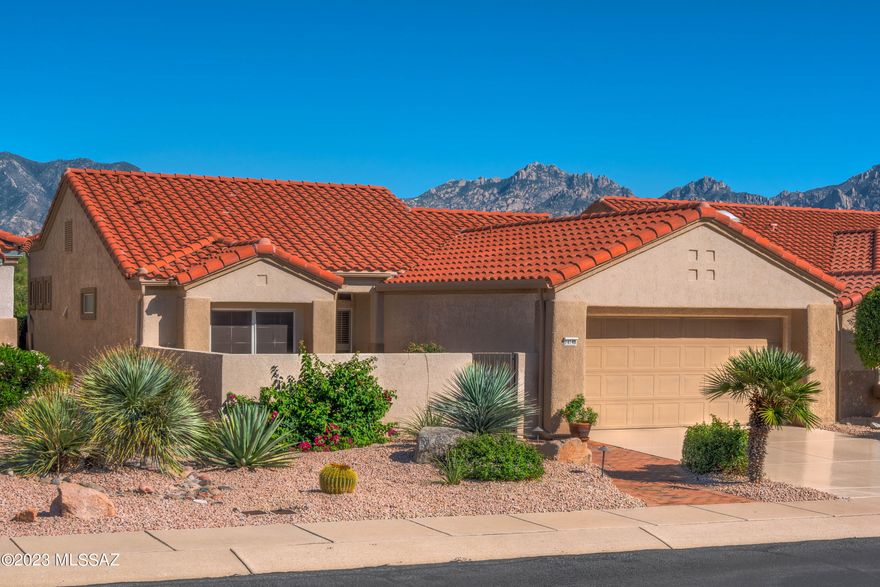 Furnished & fabulous 2BD/2BA (1,496 sq ft) split bedroom plan in Sun City Oro Valley boasts panoramic Catalina views! All new interior paint. Gated front courtyard flows to Living Room with architectural detail. Chef's kitchen showcases sleek appliances, breakfast bar and dining nook w/Catalina views. Extended Master Suite hosts a large sitting room with views and en-suite bath w/walk-in shower. 2nd bedroom offers wall unit w/Murphy bed and adjoins full hall bath. Small room off kitchen for office/storage. Garage cabinets & laundry w/sink. Brick paver front/rear patios. Pergola covered rear patio looks out upon open space with panoramic views.  Sun City Active Adult Community features a clubhouse, golf, fitness center, pool, library & more! All furnishing included!