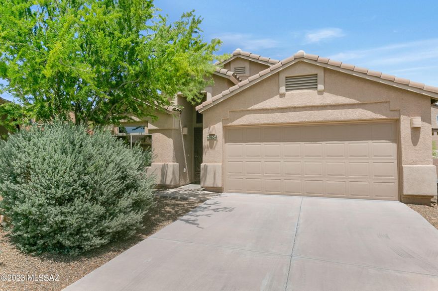 We're Proud to Present a Ranch Style Home in Eagle Crest Ranch. Spacious Living Room as you enter the home. Open Concept Kitchen / Family Room. Kitchen offers Quartz Counters, Gas Range, Black Appliances with newer Slate Refrigerator, & Cherry Color Cabinets. Family Room has slider to Patio. Double door entry to Owner's Suite has Bathroom with walk-in shower & Walk in Closet. 2 Guest Bedrooms with closets & bathroom nearby. Laundry Room has Washer & Dryer. Carpet & Ceramic flooring (New carpet in family room, owner's suite & closet). 2 Car Garage has work bench, cabinets & newer Water Heater. Covered Patio with extended paver patio. Enjoy your fruit trees, lovely landscaping, & gated yard. Just the place to call home!