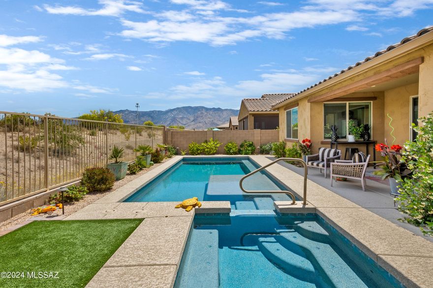 Why wait to build when you can have this move-in ready home? Gated Silverhawke community home boasts 3B/2.5b plus den and plenty of storage. Entertainer's dream with Great Room, Dining area and Kitchen all centrally located with access out to patio and your gorgeous heated pool and spa. Relax in the primary suite with a huge attached bath, dual sinks and walk-in shower. The 2nd and 3rd bedrooms have attached Jack & Jill bath with separate sinks and walk-in closets to make getting ready easier. Catalina views from front and side as well as Tortolita views out the back to enjoy sunrise and sunset. Close to restaurants, shopping, movie theatre, trails and across the street from the neighborhood park. This home is a must see!