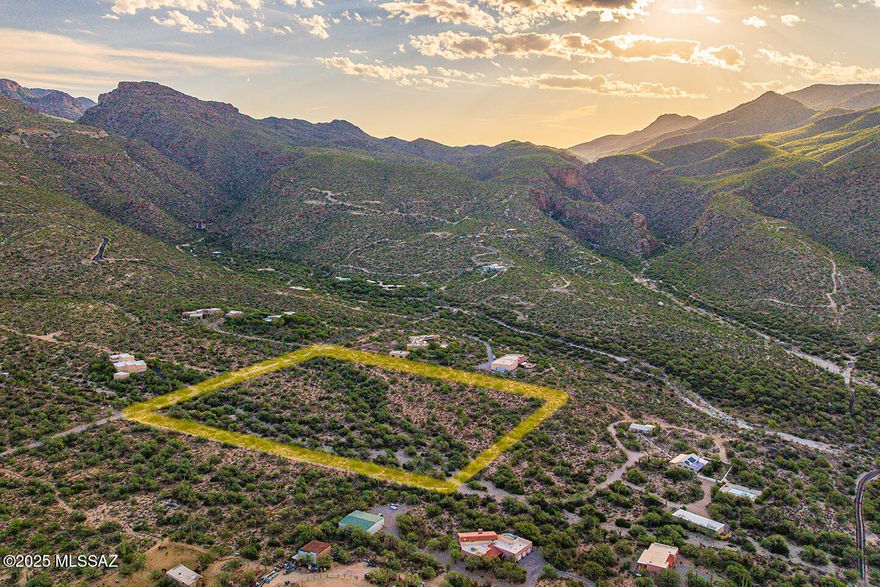 Located in the serene Agua Caliente neighborhood of Tucson's highly desirable Tanque Verde Valley, this beautiful 10-acre parcel offers the perfect blend of privacy, natural beauty & opportunity.  Enjoy peaceful rural living surrounded by scenic desert landscapes & endless outdoor recreation, just minutes from Agua Caliente Park, Molina Canyon, Agua Caliente Canyon & the scenic route to Mt. Lemmon. Ideal for hiking, horseback riding or simply soaking in the beauty of the Sonoran Desert. The lot is largely flat & mostly usable, with breathtaking views of the Catalina Mountains, dramatic canyon backdrops, brilliant sunsets & star-filled night skies. The property features an abundance of mature saguaros & native desert vegetation, creating a truly picturesque setting. Zoned SR, (Suburban Ranch) with a min lot size of 3.31 acres, there is potential to split the property, buyers should verify with Pima County for specific development opportunities.
TEP Electric pole on property line.
City of Tucson Water service map says available, property line or close by.  Buyer to verify with City of Tucson Water if available.