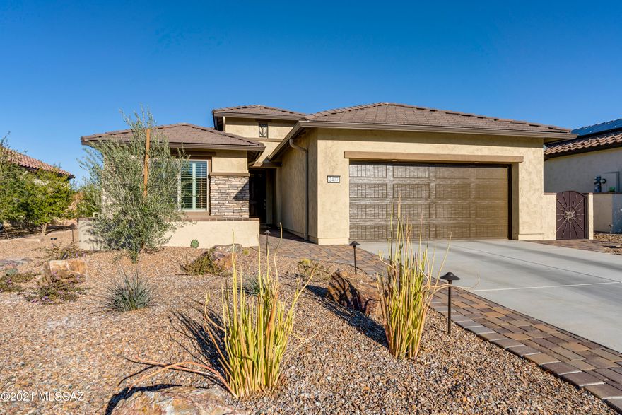 WHY BUILD WHEN YOU CAN OWN THIS  2019 MONTECITO!  Light & bright w/lots of upgrades in this compact 2 bed/2 bath split floor plan!  The den has doors for your overflow guests or added privacy.   Custom details include:  GE stainless steel appliances, 42'' cabinet, full height backsplash w/undermount lighting, custom paint, upgraded light fixtures & ceiling fans, smart thermostat.   Master en suite bedroom is spacious & a master bathroom w/a full height tiled custom showered w/semi-frameless enclosure.  Electronic Shades & extended patio make entertaining a breeze!  Water softener/overhead garage overhead cabinets.