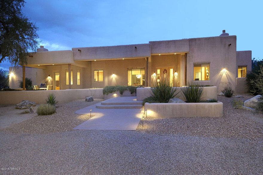 Outstanding all masonry stucco 2006 Southwestern home in the Tanque Verde Valley on 14.52 glorious mesquite covered acres (could be subdivided into 2 more lots) built by Sundown Builders. Gated entry leads down long and winding road to this private Tucson style home with 4,336 sqft, 4 bedrooms, 3 fireplaces, 3 car garage and lap pool. Courtyard entry leads to living room with soaring ceilings, extensive use of 18''x18'' tile floors, neutral colors, viga beams, living/dining room w/beehive fireplace and ''hidden'' speaker system. Glorious gourmet kitchen opening to family room w/beehive fireplace features oversized party island with sink, granite counters, Viking professional gas range, designer stainless steel appliances, warming drawer and pantry w/wine fridge. Shared gate & shared well.
