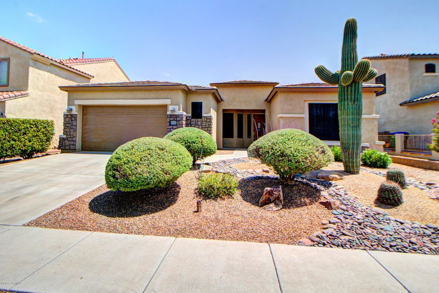 Resort lifestyle living! Beautiful DeAnza model, single story 2,142 sq. ft. home 2BD/2BA+den w/stone front curb appeal. Foyer leads to a formal dining area, den, guest bath w/dual vanities w/a walk-in shower & a bedroom. Open space concept of family room, kitchen & eating area. Plenty of kitchen cabinet space w/under cabinet lighting, pull out drawers, bkfast bar & spacious pantry. Spacious master suite w/dual vanities, garden tub, walk in shower & walk in closet. Laundry room w/utility sink. Relax in an enclosed screen porch & professionally landscaped backyard. Additional features: surround sound entertainment system, high ceilings, plantation shutters, tile flooring, water softener, 2.5 car garage w/epoxy & fresh interior paint.
