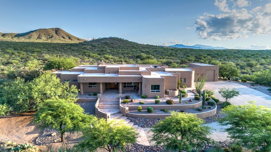 Beautiful custom home. situated on 1.75 acres. Custom knotty alder cabinets and doors throughout. Formal dining room w/custom knotty alder built-in cabinets. Travertine floors with matching baseboards. New window package, huge master suite, master bath and walk-in closet. finished floors in a 2 car garage plus 1 car garage, and an RV garage (40x16) which includes a workshop with a 3/4 bath. Additional storage galore! Professionally landscaped, large outdoor kitchen, outdoor gas fireplace, and a spa. giant covered porch with ceiling fan. Amazing views!!