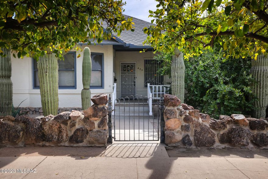 Impeccably and respectfully updated historic bungalow home in the heart of West University. Original wood floors, moldings, windows, built-ins, and architectural details, coupled with updated plumbing, electrical, HVAC, kitchen and bathrooms. Historic homes often lack storage, but this home has 7 closets, a pantry, a basement, a 2-car garage and nearly 1,000sqft of EASY-ACCESS attic space! Enjoy the secluded and shady walled back yard, or the front porch complete with swing. Pop over to any of several nearby cafes for coffee in the morning, dinner at night, or take 50 steps to the nearby streetcar stop to explore the rest of Main Gate and downtown. Limited SPDS. Listing agent is part owner and has a financial interest in the property, and is licensed to sell Real Estate in Arizona