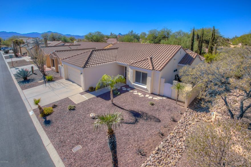 Immaculately maintained, upgraded home in North Ranch. Enjoy the privacy of a corner lot with a low maintenance paver backyard backing up to open space, complete with covered patio.  New energy-efficient dual pane windows, new HVAC, tile floors, and updated bathrooms. HUGE Community Pool, Spa, Parks, Ramada, and Tennis Courts. This home will not last; make your appointment to see today!
