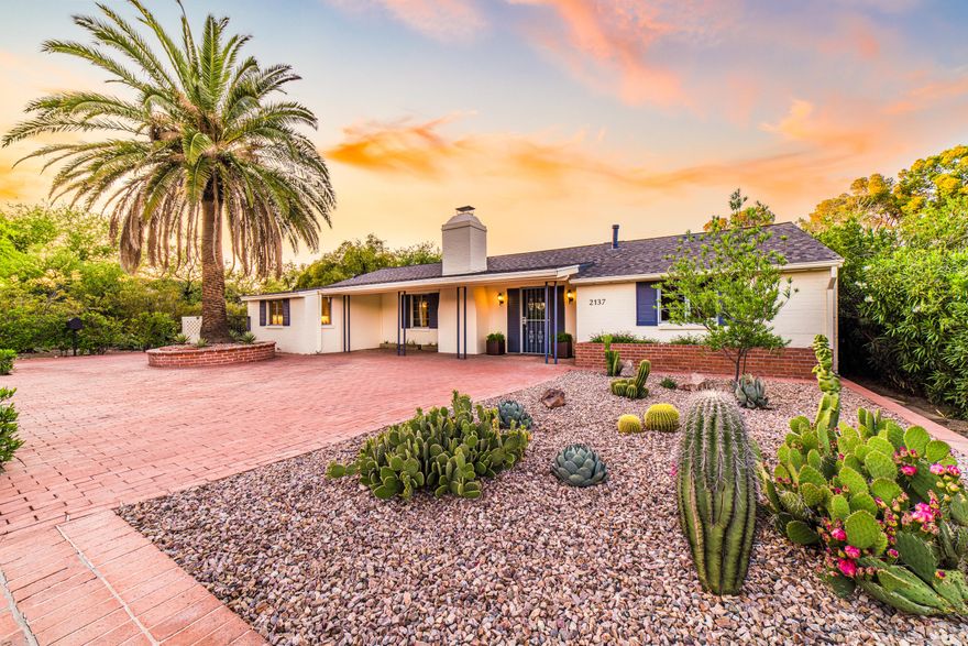 STUNNING, historic home, with Guesthouse located near the prestigious & iconic Arizona Inn, Banner Hospital & UofA. This 1948 Ranch style home has been lovingly updated with great care taken to maintain the charm & historic designation. Spacious Greatroom w/Fireplace, built-ins & floor to ceiling glass and patio doors to the outdoor living. Light & open kitchen, dining & hall bath completely remodeled in keeping with era. Master suite features one of the finest dressing rooms w/built-in closets & drawers leading to the completely renovated master bath & laundry closet. Br#2 w/ large closet, BR#3 features built -ins & corner desk. Lush backyard w/privacy, covered/uncovered living, 1 BR Guesthouse w/laundry room & storage, 3 Car Garage. See update list under Document link