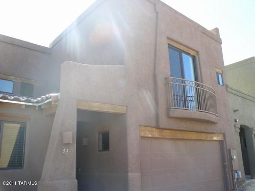 Home located on the Santa Rita Golf Course. Incredible views. Tile floors throughout the living and bathroom areas. Two story w/high ceilings. Granite tile countertops. Close to Community pool and spa and Golf Course.