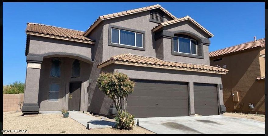 Gorgeous 2 story home with all the amenities a family needs, both inside and outside. Vaulted
ceilings, carpet and tile throughout home, with newer paint on exterior. Enjoy beautiful sunsets from
your deck off master bedroom. Master bedroom has soaking tub and separate shower with walk in
closet. Private sitting room off master bedroom. Backs up to common area with gorgeous view of
Tucson Mountains. Near park and walking trail.