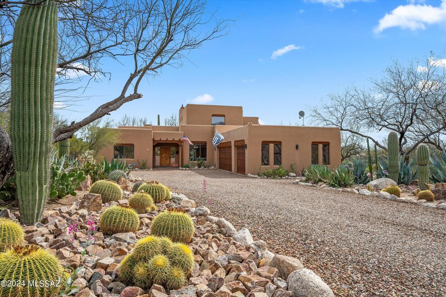 Seller will accept/counter offers between $775k-$800k. Gorgeous home located in the desirable Tanque Verde Valley near Redington Road. Tranquility abounds with this amazing saguaro studded property with outstanding city, mountain, and sunset views. Bright and spacious split bedroom floor plan w/ beautiful exposed Vega beam ceilings. Spacious kitchen with island and stainless steel appliances. Huge primary suite with private balcony and views of the city. Double vanity with separate shower/tub, and walk in closet. Covered patio overlooking sparkling pool and waterfall feature. Amazing professionally landscaped backyard with native plants true to Tucson! Must see and fall in love!