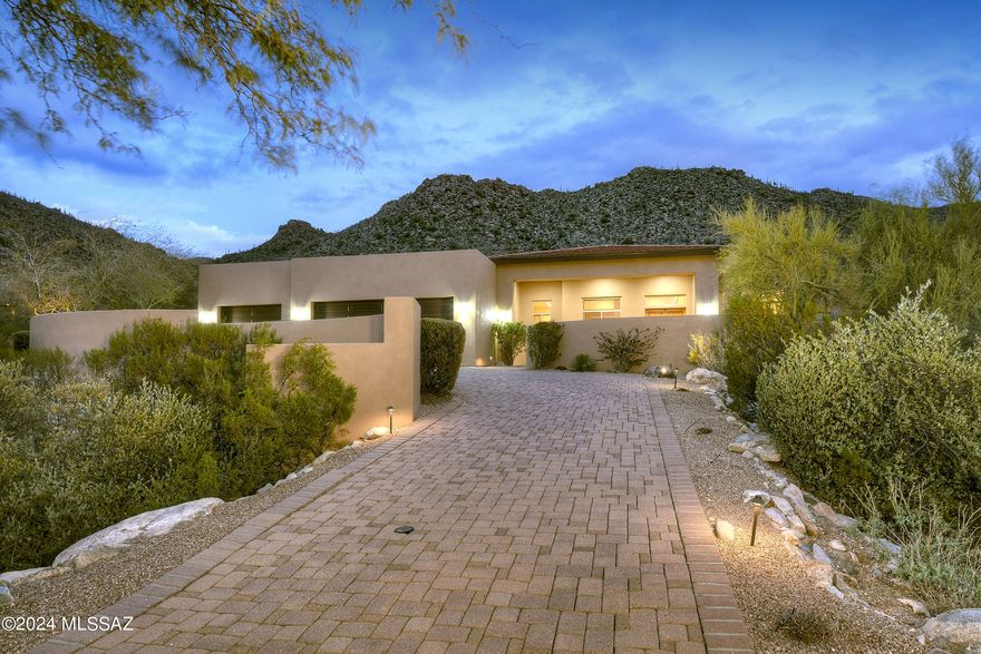*MODERN ELEGANCE* ELEGANT SW CONTEMP NESTLED AT THE BASE OF THE TORTOLITA MTNS! AMAZING LOCATION- BORDERS THE NORTH ''GALLERY'' GOLF COURSE! SURROUNDED BY MAJESTIC MTN, SOARING SAGUAROS & HISTORIC ROCK FORMATIONS- OF THE SONORAN DESERT! TOTAL SERENITY & TRANQUILTY FILL THIS ESTATE! TIMELESS ''MODERN STYLE'' OFFERS- WONDERFUL GREAT RM CONCEPT- FILLED W/GLASS & INCREDIBLE  DESERT VIEWS! PERFECT GETAWAY...HIKING/BIKING, GOLF, STATE OF THE ART- FITNESS CENTER, RITZ CARLTON RESORT, RESTURANTS...ENJOY  DOVE MTN LIFESTYLE! BUILT BY BERISHA HOMES- BOASTS FINE APPOINTMENTS & QUALITY THRU- OUT...NATURAL STONE FLRS, *OWNED* SOLAR SYSTEM, ALL EN-SUITE BRS, 2X PRIMARY SUITES, GUEST WING,  OFFICE- FLEX RM W/COZY FP, FORMAL DINING,  OVERSIZED 3 CAR GAR, FURNISHINGS AVAIL- TURN KEY! GREAT VRBO/INVESTMENT