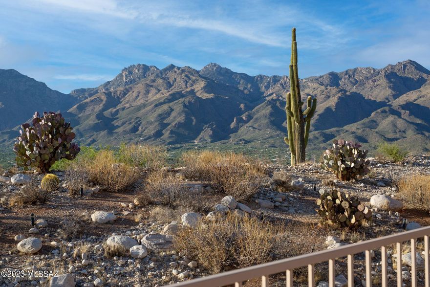 Enjoy the Million dollar 180 degree unobstructed views of spectacular sunsets from gated Sabino Mountain. Note the automatic solar blinds, & the classy den/office built-ins. Morning sunlight reflects off the observatories on Kitt Peak 60 miles away, the lights of downtown & the valley sparkle, & the Catalina Mountains & Sabino Canyon are 1 mile away. Roof & interior/exterior paint in 2023, & both AC systems are new in the last 5 years. The home is located on a cul-de-sac with little traffic. Exercise with spectacular views on a two mile loop of gentle hills in Sabino Mountain. Close to fine dining & casual restaurants, shopping,  hiking & biking, banks, medical offices & highly thought of Tucson Medical Center Hospital. Come & enjoy the view for an hour... or a lifetime. You will like it