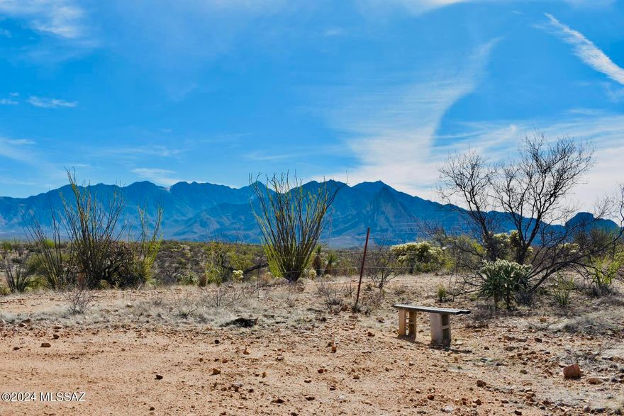 Come and explore this 9.5-acre lot that borders Arizona State Land. This lot is located in Elephant Head and would be a fantastic location for your new home! You have views of Elephant Head, and the Santa Rita Mountains and can see  Tucson and Nogales in the distance. This location allows plenty of privacy yet is still close enough to be in Green Valley in 15 minutes. You are free to build any home you would like or bring in a manufactured home since there is no HOA or Deed Restrictions. Please call today for more information and to schedule your appointment to walk the property together.