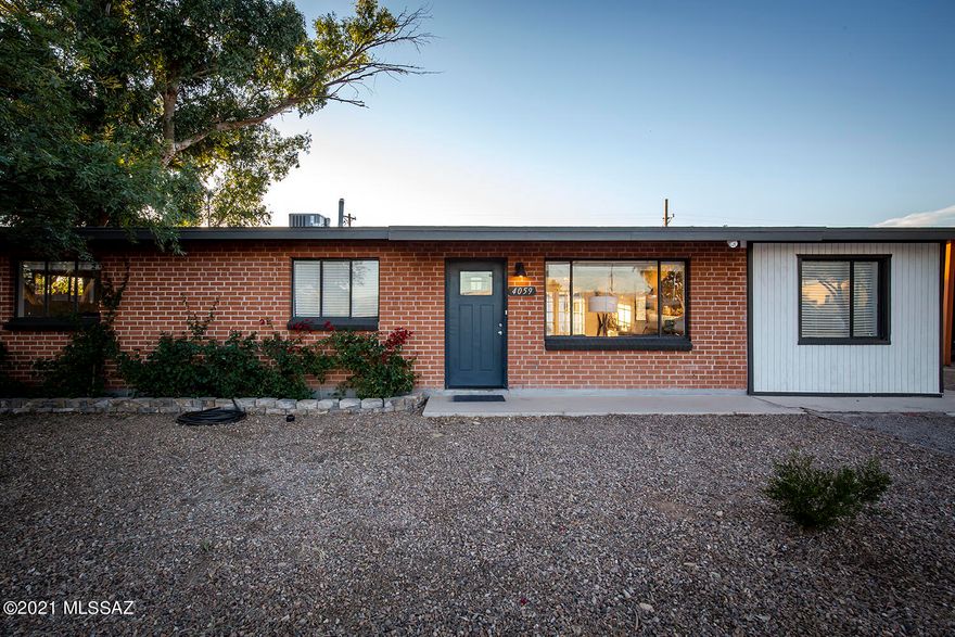 A sweet mid-century oasis conveniently located in a central part of town. Step into this 1959 solid brick home and find yourself never wanting to leave! A roomy 4 bedroom / 2 bath home with an approximately 300 sq ft. detached guest quarters (no kitchen /bath), studio or office. This house has plenty of designer upgrades to show off. The backyard is just as cozy and beautiful as the main house, with its garden nooks, fruit trees, patios and a converted space, the current owners used as a music studio, but could be a separate guest quarters or office space that steps out to view a gleaming pool! This house is a Tucson gem and perfect for entertaining! Conveniently located next to shopping centers, the Rillito river path, Trader Joes and Sprouts, and about just 12 min away from Downtown!