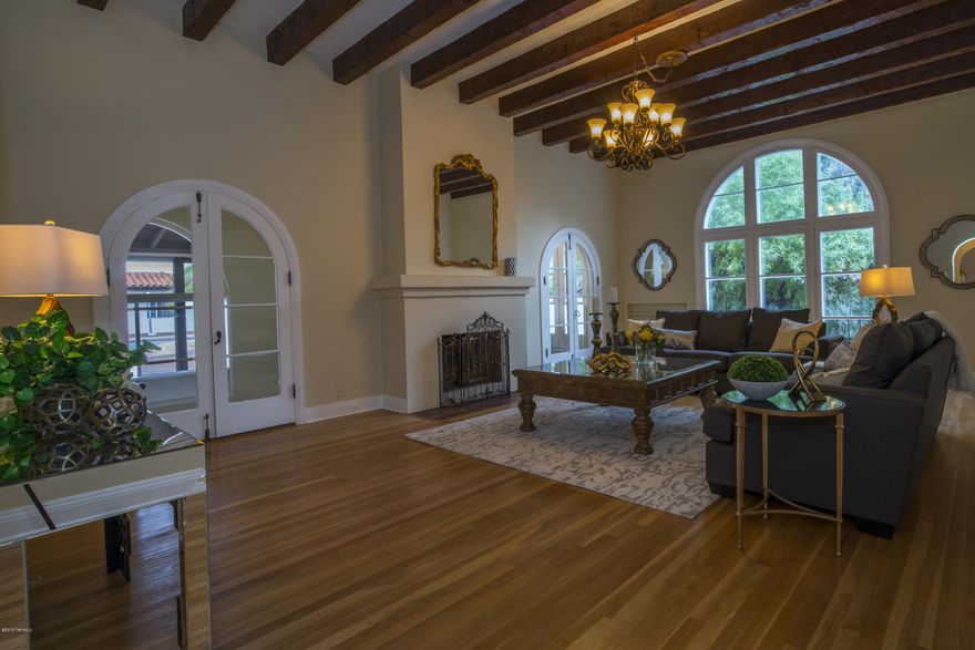 REDUCED! HISTORIC 1929-3BR/3.5 Baths 4610 Sqft & Full GH 1BR/1BA-802 Sqft.Architect MH Starkweather (Arizona Inn).Stunning Living Room w/Beamed Ceiling & Fireplace, Opens to AZ Rm. Office/Den W/Beehive FP.Huge Master Suite & Closet/Thermo Massage Bath.Enchanting Bedroom W/Dressing Rm & Balcony Overlooks Plaza Encanto. Like New Original Hardwood Floors.New Plush Carpet. Pebble Tech Pool. Separate Waterfall/Pond. Private Yard.  Downstairs BR/BA or Family RM with Handicap Accessible Bathroom.Guest House W/Full BR,Bath,Living RM, Carport,Porches, Washer/Dryer/HVAC system also Handicap Accessible& grandfathered in,can legally rent it out. Documentation from City Attached.Fantastic 2/3 Acre Lot On North Side of Plaza De Encanto.  Historic El Encanto- bike to U of A or downtown,Walk to Reid ParK
