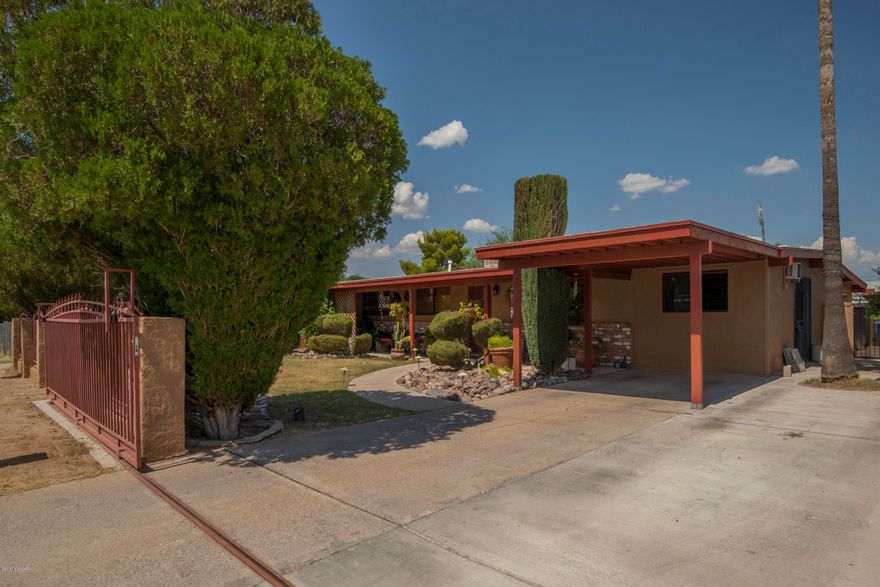 Absolutely beautiful! Totally remodeled with new kitchen cabinets, granite counters, new appliances, tile floors. This home has central air, new bathrooms an extra family room. Did I mention the fabulous covered patio/party room and storage building. Wow!