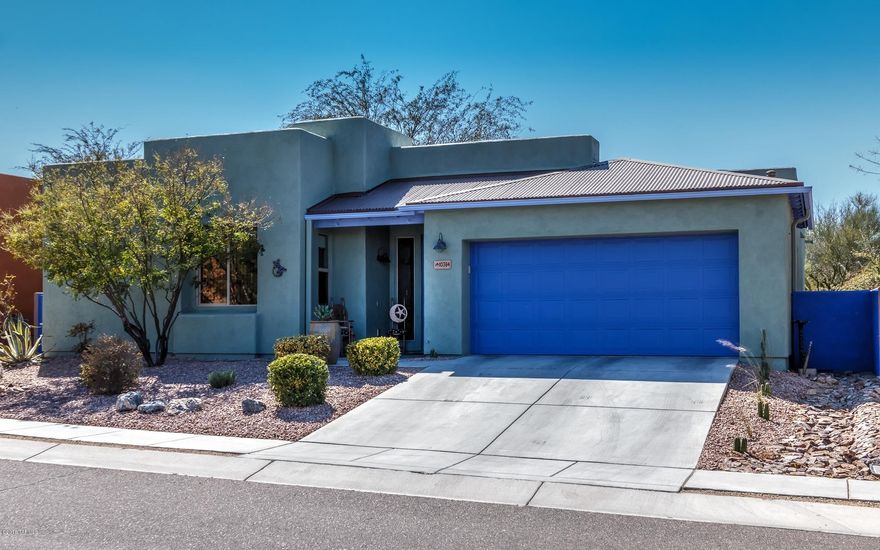 Beautiful, exceptionally well-maintained home in Civano! 4 bedrooms, 3 bathrooms, 2192 Sq. Ft. 20'' tile flooring throughout. Kitchen features granite counter tops w/large farm sink and commercial faucet. Custom interior and fresh exterior paint. Dual sink executive height vanity in the M. Bathroom. Large walk-in closet in M. Bedroom and lots of storage throughout the home. Tile shower and tub surrounds in all bathrooms. Ceiling fans in all rooms. Laundry Rm. incl. double utility sink. Garage has built in storage cabinets and overhead storage rack. Back covered porch features extensive hardscaping for outdoor living. Raised beds planted w/roses along the patio walls and the backyard has kumquat, Arizona sweet, blood orange and meyer lemon trees. This home shows extremely well, you must see