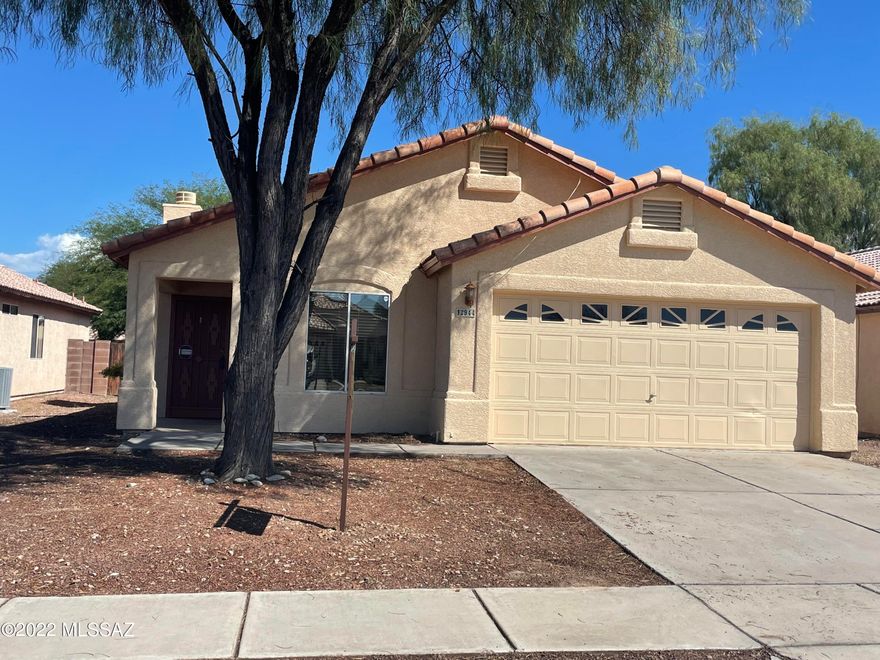 4BR/2BA home w/desirable floor plan near a neighborhood park, close to shopping, golf, downtown, University of Arizona, Pima Community campus, St, Mary hospital and Banner Hospital.  Living room and dinning room combo a fireplace.  Vaulted ceiling with ceiling fan.  Beautiful tile throughout, carpet in bedrooms, spacious master w/bay window Guest bathroom has a skylight. Plenty storage through out eating kitchen. Covered patio.  Covered patio, low care front/backyards.  Newly paint both exterior and interior.