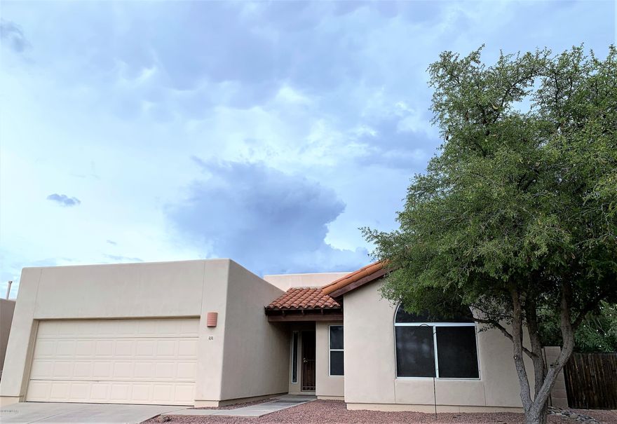 Coveted quiet cul de sac location with desert behind, and backyard mountain views!! Spacious open kitchen features new stove, breakfast bar, breakfast nook and a pantry including slide out shelving. Wonderful split floor plan with two bedrooms and a bath on one side of the home,  with the owners suite on the other. The expansive owner suite features a large bathroom with skylight, two closets, garden tub and separate shower. There are ceiling fans throughout the home, soaring ceilings, and a defined entry. Fresh paint and new carpet!! Your backyard features low care landscaping, covered patio, and mountain views.
