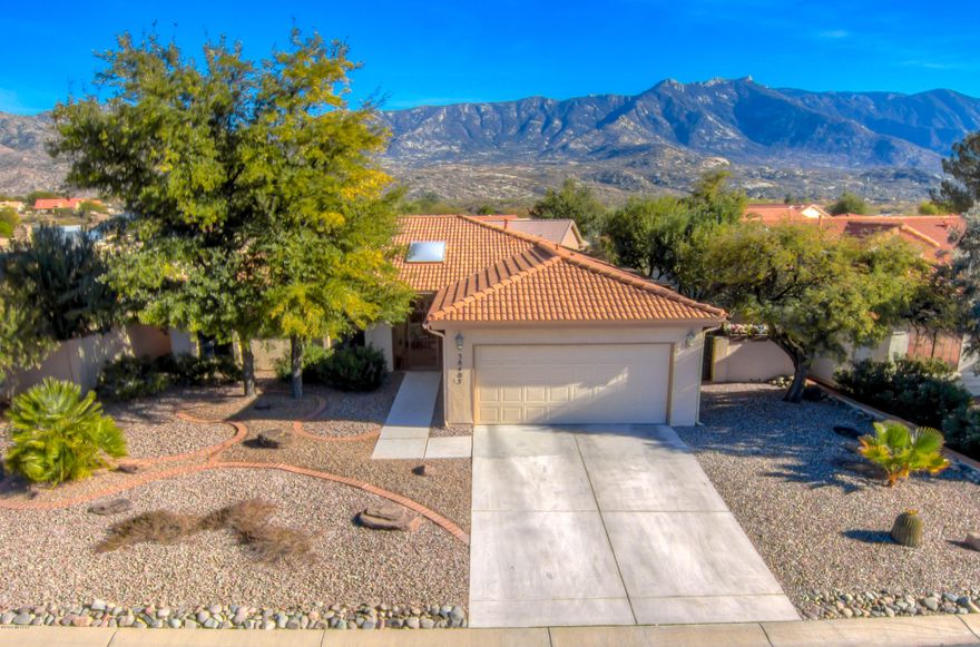 This home has a very private backyard with an east-facing patio and mountain views located in SaddleBrooke, Tucson's premier active adult retirement community. This is the Alameda model in HOA 1. The kitchen and bathrooms have been updated. Large master suite with slider to see the pool and mountains. Newer roof.  Enjoy the sight and sound of water in your serene backyard conventional pool. This is a must see!