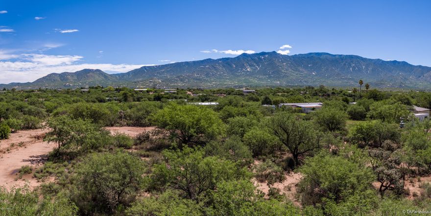 Seller shall entertain and/or counter offers from $105,000 - $110,000. Seller shall offer $10,000 Well Credit upon accepted contract. All 3 Lots now available for one low price!! Spectacular Panoramic Mountain Views from this flat 3.36 Acre home site! Paved road all the way to the property and situated in a great community just minutes from town. Property has been separated into three lots (Two - 1 acre parcels, One - 1.36 Acre parcel) with three addresses for tax purposes. Buyer can keep the properties separate or combine all three into one property. Property is staked & fenced on three sides. No HOA!  Electric & Gas lines on Forecastle! Please see attached documents for recent survey (6/16/16) and plat maps. 2 Imagine building your custom dream home in NW Tucson!