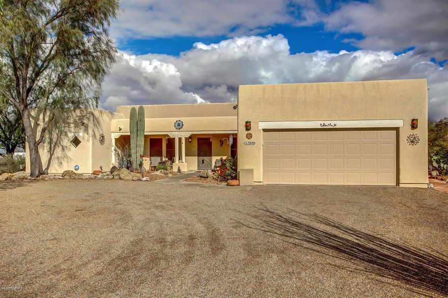 Stunning 3 Bed, 1.75 Bath Features Tile Flooring, Neutral Interior Palette & Cozy Living Room Fireplace. Gorgeous Kitchen Just Remodeled In 2012 w/ Granite Counters, SS Appliances & Plenty of Light Wood Cabinetry. Spacious Spare Rooms w/ Plush Carpeting & 3/4 Guest Bath w/ Double Sinks! The Roomy Master Boasts Large Walk-In Closet & Private Bath w/ Double Sinks, Soaking Tub & Separate Shower. Enjoy Privacy While Still Having Neighbors Close By Courtesy of This Carefully Thought out lot - This Home Offers Beautiful Distant Mountain Views, Covered Patio & Closed In Yard Space That Can Be Expanded! Tons of Storage Space In Large Shed That Can Be Plumbed & Wired For Electricity If Needed! Home is Alarm System Ready, Roof was Just Recoated in 2015 & Front Loading Washer & Dryer Included!!