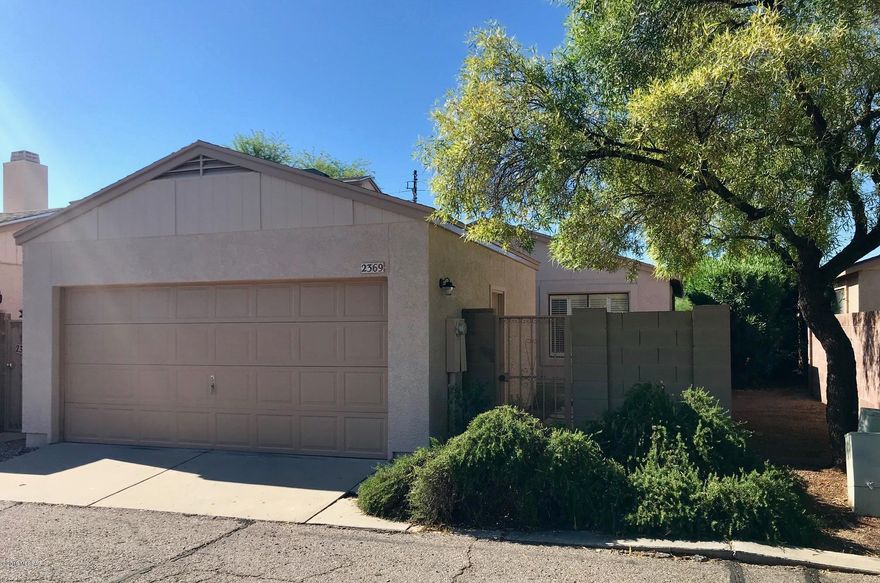Gated entry Ironwood Ridge Patio home only minutes to downtown or the northwest side of town, U of A, Pima College and or  hiking trails! All Poly removed over the last couple years, just installed new Tile,new carpeting and freshly painted inside and out! features all plantation shutters, all appliances (in as is condition) stay. Spacious 2 bedroom 2 bathroom with private front and back courtyard. Master has covered,private patio with mountain views! Light and Bright floor plan with vaulted ceilings, (no POPCORN!)  formal dining room and eat in kitchen, tons of storage and cabinetry. Immaculately cared for in Gated community with pool! Plus 2 car garage!  Even comes with a 5 year termite warranty and a home protection plan.  Fabulous opportunity!