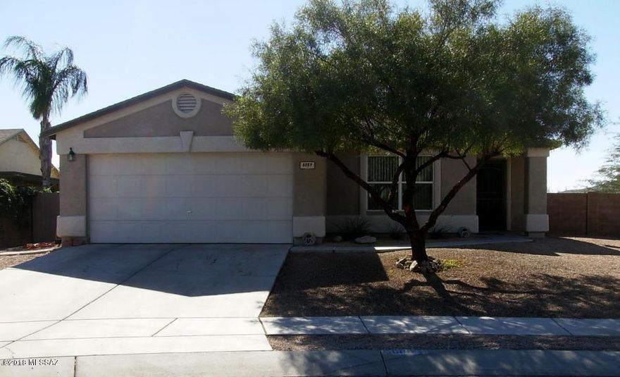 Lovely 2bd/2ba home with den or home office on Tucson's scenic west side awaits its new owner! This home features a tasteful, neutral decor with custom window coverings, a bright open kitchen with breakfast bar and Energy Star appliances. All appliances convey! Central vac makes vacuuming a breeze. The den or home office could easily be converted to a 3rd bedroom. Spacious side yard has room for a pool and more...what a joy to bbq, entertain or just kick back in this lovely home. Located on a quiet cul de sac with mountain and sunset views.