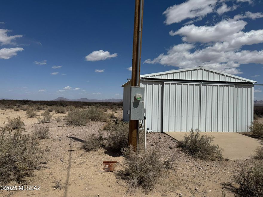 Almost 80 acres zoned RU-4 and FEMA Zone X. An outbuilding on the property. County maintained dirt road is easily traversed. Enjoy mountain views by day and dark skies sparking with countless stars by night. Electric on property and a private well, registration number 55-210597.