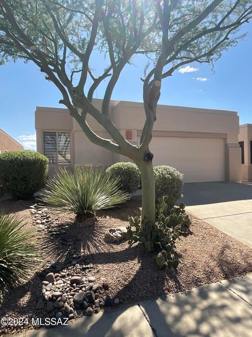 Welcome to this charming 3-bedroom, 2-bathroom home located in the convenient gated community of Northeast Tucson, AZ. This freshly painted house (interior and exterior) features new hardware, blinds, and light fixtures throughout. All new kitchen appliances as well. Granite kitchen and bath counters. The lighted vanity mirrors add a touch of luxury to the bathrooms. The garage boasts a new epoxy floor and an extra refrigerator for added convenience. Smart Home features include thermostat, alarm system and garage door. Residents can enjoy access to 3 community pools within the gated community. Available as a 6, 12 or 18 month lease. HOA maintains front landscaping and landlord has rear landscaping maintained. Don't miss out on the opportunity to make this house your new home.