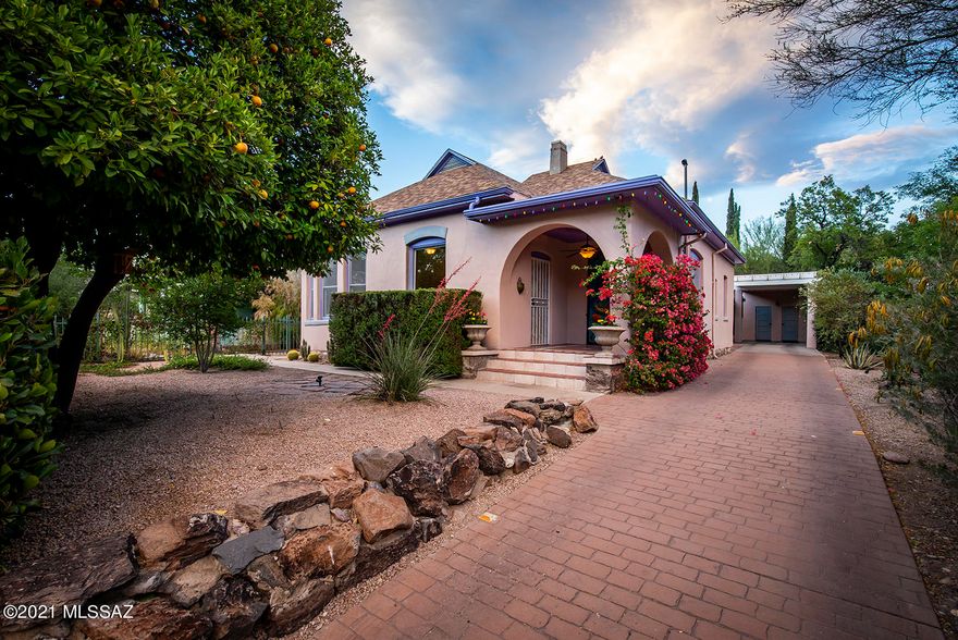 Must See This Rare Gem! Elegant Queen Anne home built in 1910 is in the very desirable El Presidio Historic District near the downtown & Arts District. Meticulously detailed with the finest materials and careful attention. Gourmet kitchen with custom cabinets, marble countertops, and brand new dual range. Gorgeous oak floors, Marvin dual pane windows, two large bathrooms with marble counter, and a walk-in slate shower. Large open guest quarters looks out to the spectacular resort-like lush garden and courtyard, with several plant specimens, vines, various citrus, pomegranate and fig tree. Detached unit would make a great home office, or studio, this space comes with vaulted ceilings, windows, and cooling. Much more, on extra-large lot, with private fire pit area for stargazing at nite.